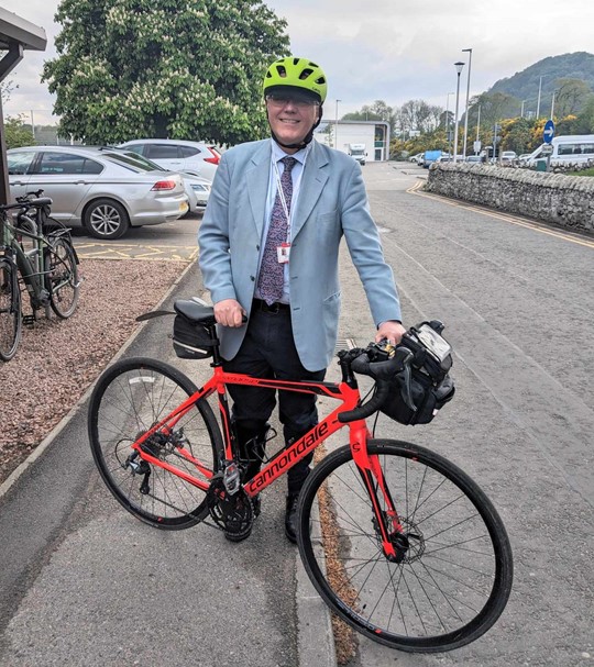 Dr Tim Allison With Bicycle