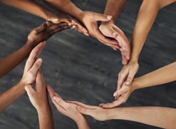 Multiracial Hands Together In Circle
