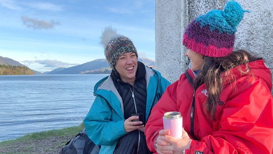 two staff nurses from Belford Hospital beside a loch at Gairlochy